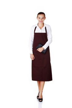 Attractive young waitress with notebook in hand, isolated on a white background