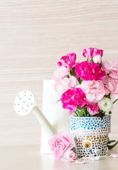 Carnation in mosaic flower pot