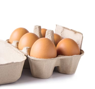 Egg box on white background