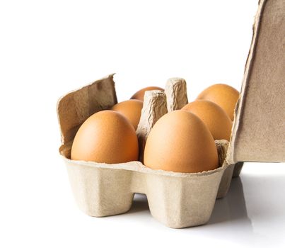 Egg box on white background