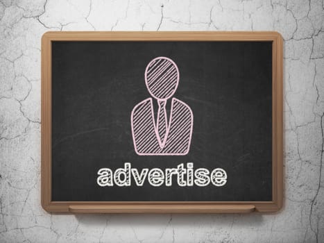 Marketing concept: Business Man icon and text Advertise on Black chalkboard on grunge wall background, 3d render