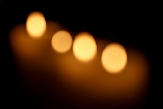 Abstract background. Blurred colorful circles bokeh of christmas candles lights 