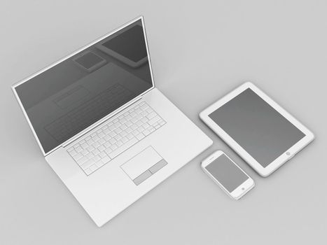 Laptop, tablet and smartphone on a gray background