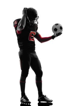 one american football player soccer ball confused in silhouette shadow on white background