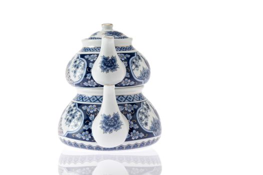 Antique blue and white Turkish teapot with the traditional double stacked kettles in which water is boiled in the larger and then used to steep tealeaves above and to dilute individual cups on serving