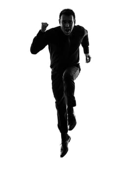 one caucasian business man running in silhouette  on white background
