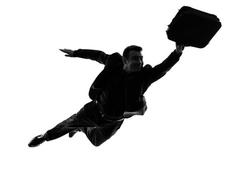 one caucasian business super man flying in silhouette  on white background