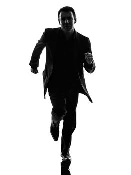 one caucasian business man running in silhouette  on white background
