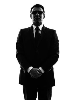 one secret service security bodyguard agent  man in silhouette  on white background