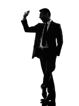 one caucasian effeminate snobbish business man in silhouette  on white background