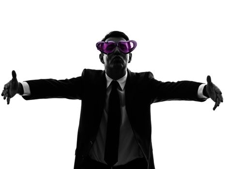 one caucasian business man loving with funny glasses in silhouette  on white background