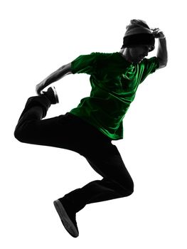 one caucasian young acrobatic break dancer breakdancing man in silhouette  white background