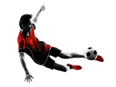 one asian soccer player young man kicking in silhouette isolated white background