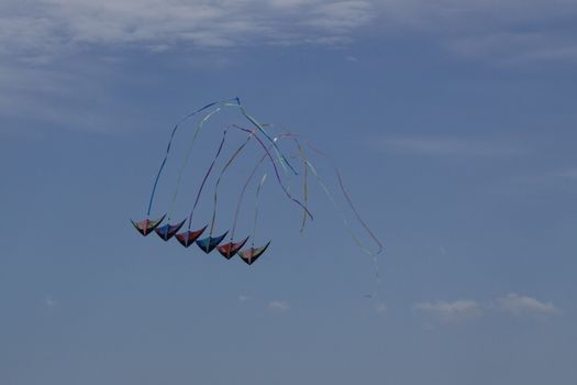 Kites against a blue sky.