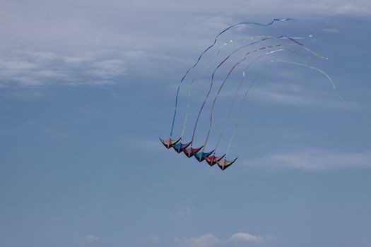 Kites against a blue sky