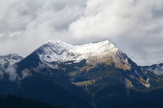 snowy mountain peak in clouds, Bavarian Alps, Germany