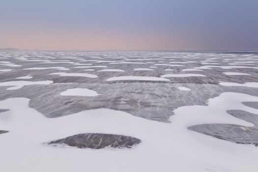 snow and wind texture on frozen Ijsselmeer lake, Netherlands