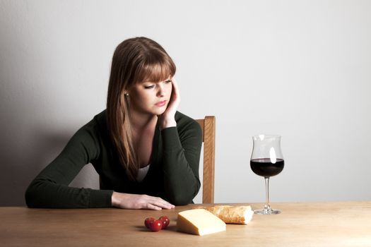 young woman and a glass of wine