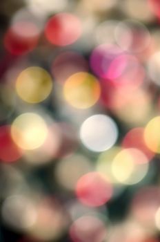 Colorful bokeh of Christmas lights on Christmas tree