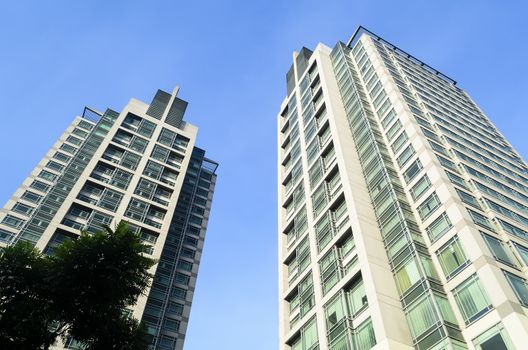 Worm's eye view of two residential buildings