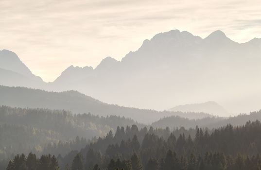 Misty sunset sunshine in mountains, Karwendel range, Bavaria, Germany