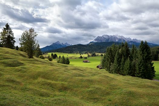 green alpine meadows and Karwendel mountains in Bavaria