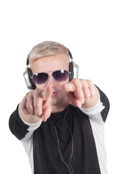 Man with headphones and sunglasses pointing his fingers