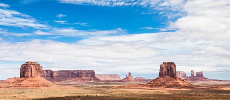 Complementary colours blue and orange in this iconic view of Monument Valley, USA