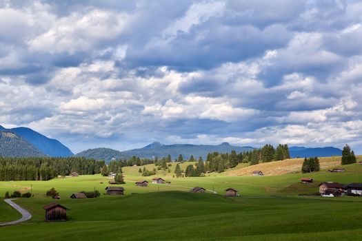cloudy sky over Bavarian farmland, Alps, Germany