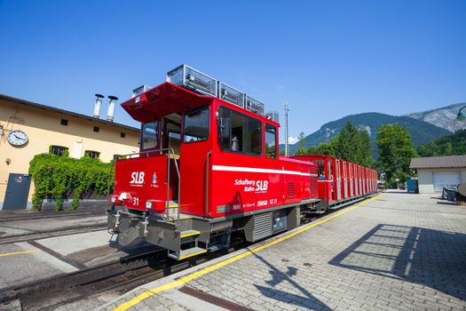 ST. WOLFGANG, AUSTRIA - AUGUST 6: Steam locomotive of a vintage cogwheel railway going to Schafberg Peak (1783m) on August 6, 2013 in St. Wolfgang.