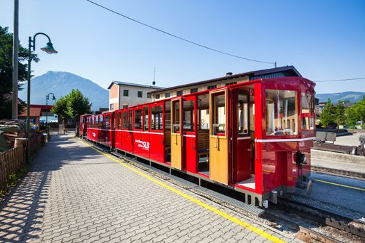 ST. WOLFGANG, AUSTRIA - AUGUST 6: Steam train railway going to Schafberg Peak (1783m) on August 6, 2013 in St. Wolfgang.