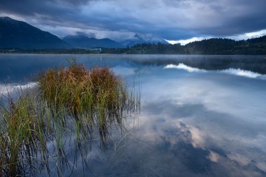 clouded morning on Barmsee lake in Alps, Bavaria, Germany