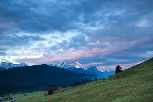 sunrise over meadows in Bavarian Alps, Germany