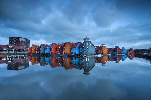 colorful buildings on water in Groningen, Reitdiephaven, Netherlands