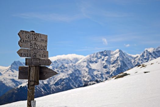 Footpath's signposts in scenic high mountain landscape, italian Alps