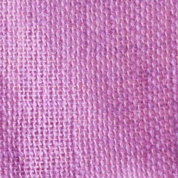 Light purple raffia background in strict close up