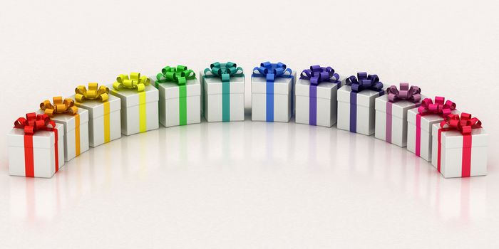 white gift boxes with varicolored ribbon on a white background