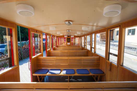 ST. WOLFGANG, AUSTRIA - AUGUST 6: Steam train inside car pasenger benches going to Schafberg Peak (1783m) on August 6, 2013 in St. Wolfgang.
