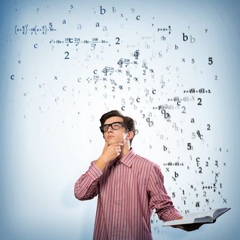 young scientist holding a book, fly out different ideas. concept of creativity