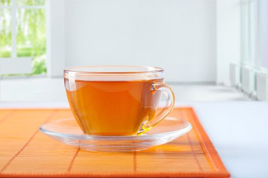 cup of tea on table in empty room