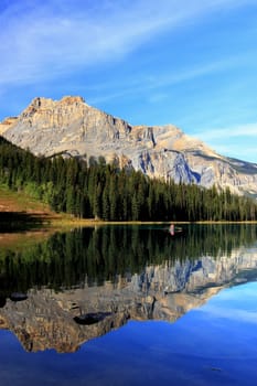 Mountains reflected in Emerald Lake, Yoho National Park, British Columbia, Canada