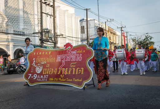 PHUKET, THAILAND - 07 FEB 2014: Phuket town residents take part in procession parade of annual old Phuket town festival. 