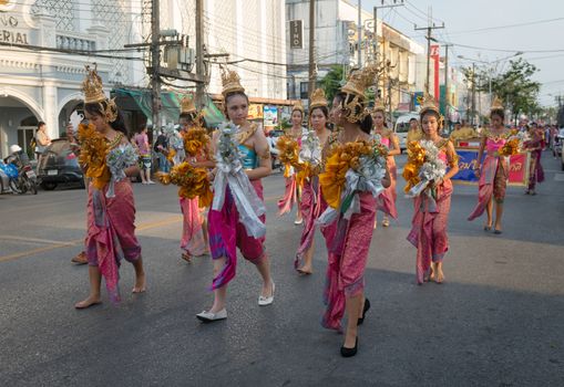 PHUKET, THAILAND - 07 FEB 2014: Phuket town children take part in procession parade of annual old Phuket town festival. 