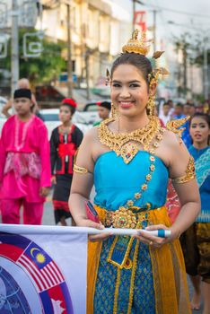 PHUKET, THAILAND - 07 FEB 2014: Phuket town residents take part in procession parade of annual old Phuket town festival. 