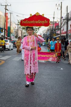 PHUKET, THAILAND - 07 FEB 2014:  Phuket town residents take part in procession parade of annual old Phuket town festival. 