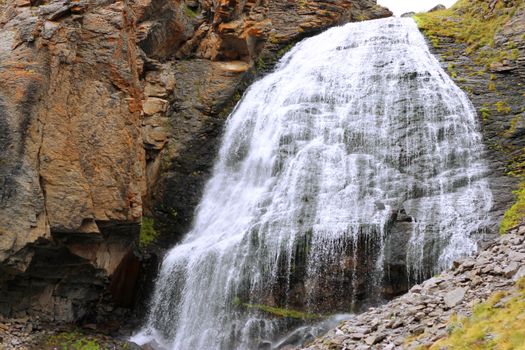 Waterfall Girlish Braids between the mountains of Northern Caucas