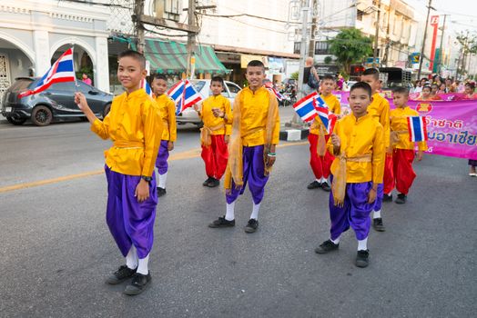 PHUKET, THAILAND - 07 FEB 2014: Children take part in procession parade of annual old Phuket town festival. 