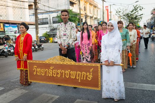 PHUKET, THAILAND - 07 FEB 2014: Phuket town residents take part in procession parade of annual old Phuket town festival. 