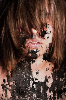 Dark art portrait of a girl with cracks