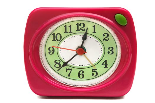red alarm clock closeup isolated on a white background